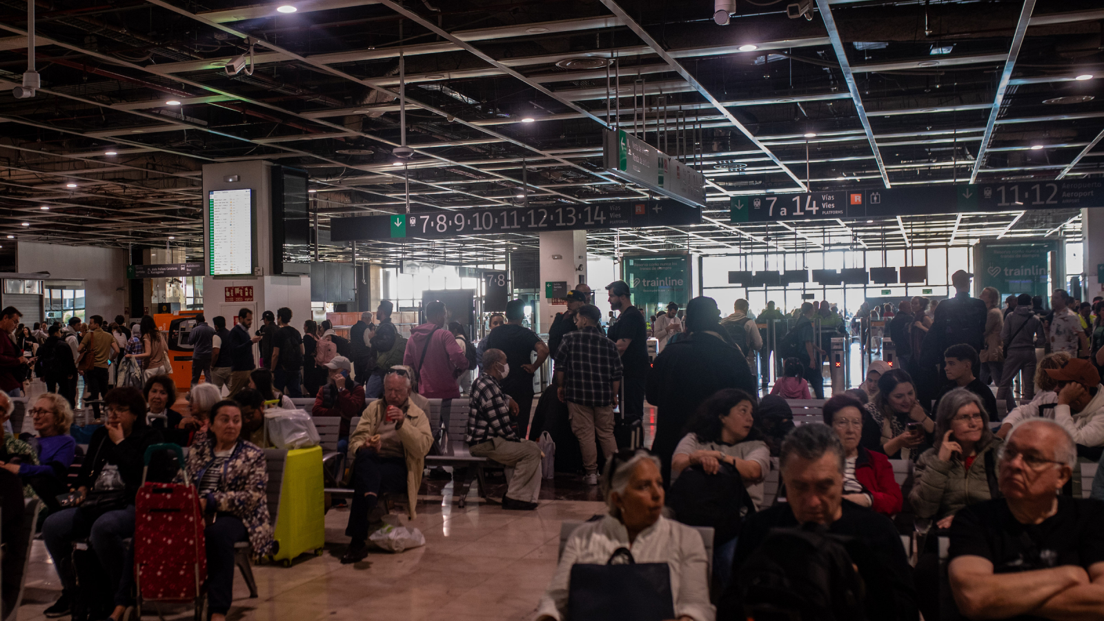 A crowd of people in Sants train station in Barcelona, Spain.